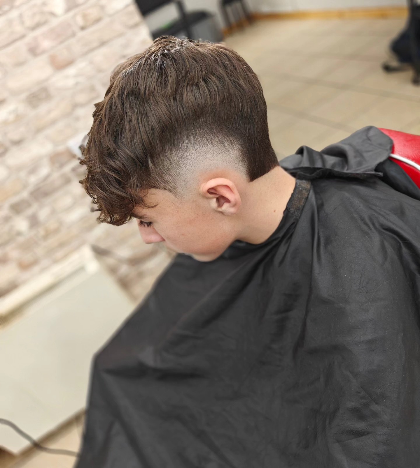 Prestige Barbers — fade with curly texture